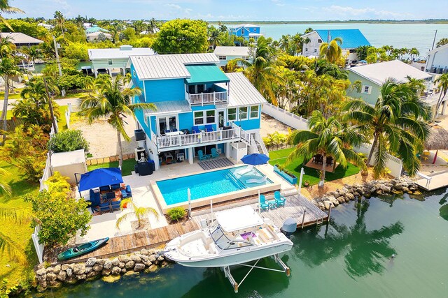 drone / aerial view featuring a water view