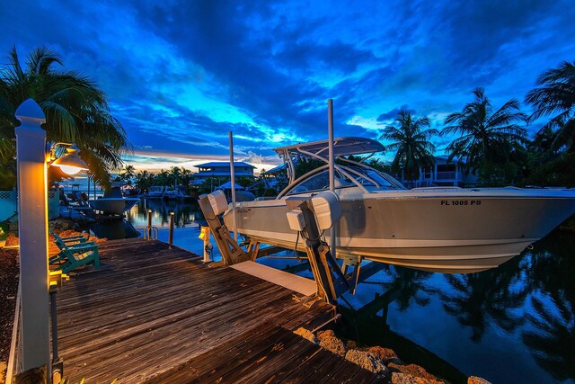 dock area featuring a water view