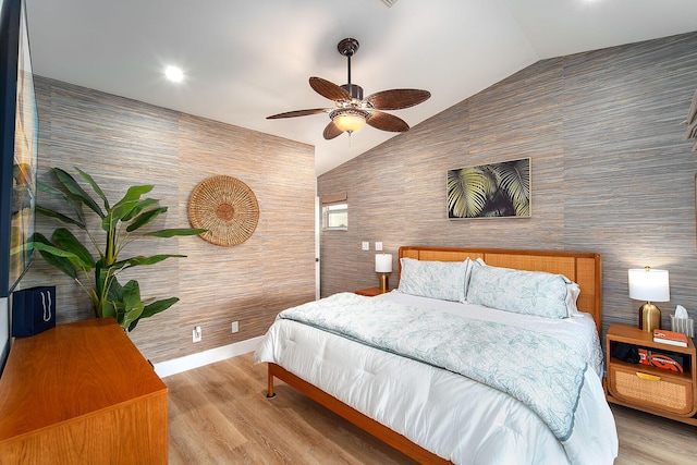 bedroom featuring vaulted ceiling, ceiling fan, and light hardwood / wood-style floors