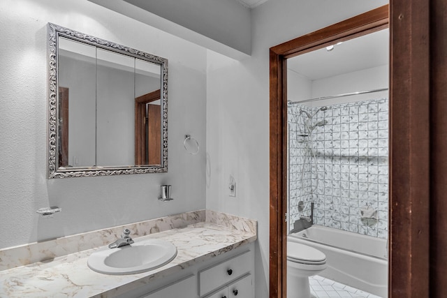 bathroom featuring  shower combination, vanity, and toilet