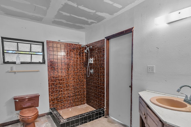 full bath with toilet, a stall shower, and vanity