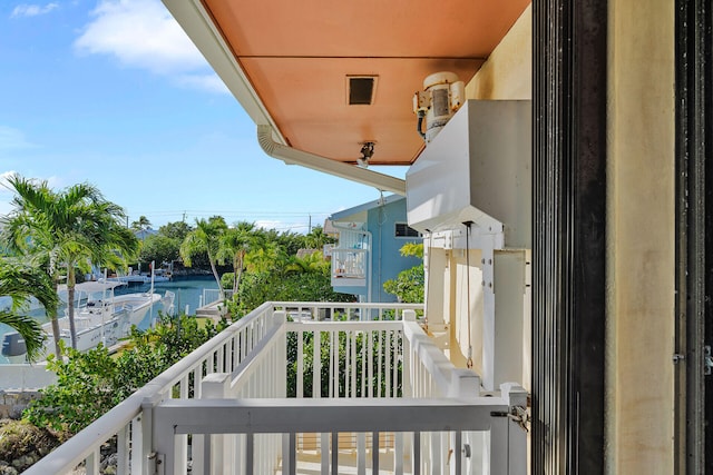 balcony featuring a water view