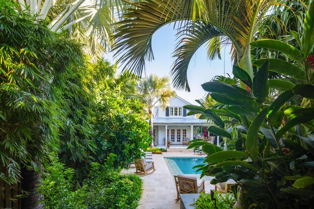 1109 Fleming St, Key West, FL 33040 - swimming pool featuring french doors and a patio