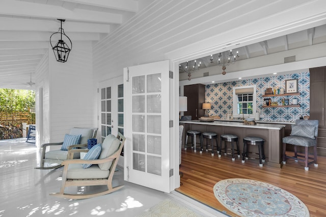 1109 Fleming St, Key West, FL 33040 - interior space with french doors, wood finished floors, and beamed ceiling