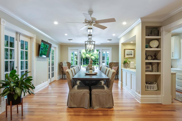 1109 Fleming St, Key West, FL 33040 - dining space with french doors, light wood-type flooring, ceiling fan, crown molding, and recessed lighting