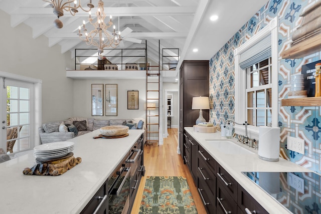 1109 Fleming St, Key West, FL 33040 - bathroom with a sink, wood finished floors, and a chandelier