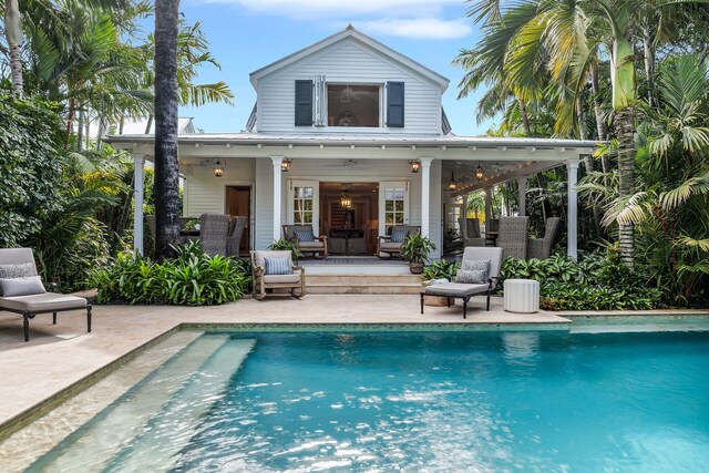 1109 Fleming St, Key West, FL 33040 - rear view of property with a patio area, an outdoor pool, and ceiling fan