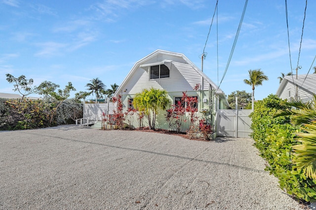 241 5th St, Key Colony, FL 33051 - view of front of house featuring a gate