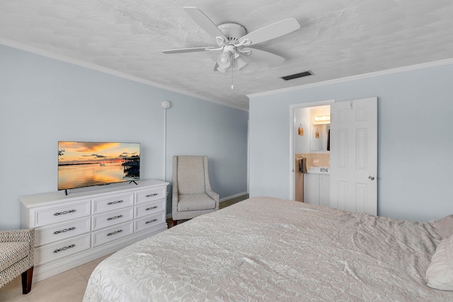 bedroom with ceiling fan, ensuite bathroom, light tile patterned flooring, visible vents, and crown molding