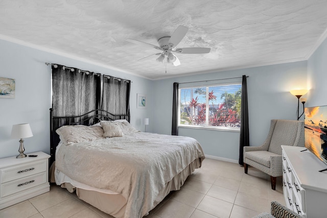 bedroom featuring crown molding, a textured ceiling, baseboards, and light tile patterned floors