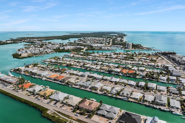 aerial view with a water view and a residential view