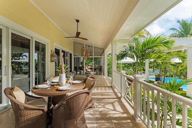 balcony featuring ceiling fan