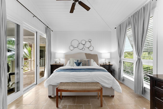 bedroom featuring lofted ceiling, access to outside, and ceiling fan