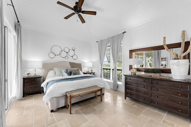 bedroom with lofted ceiling and ceiling fan