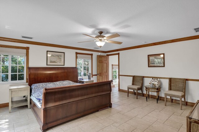 bedroom with crown molding