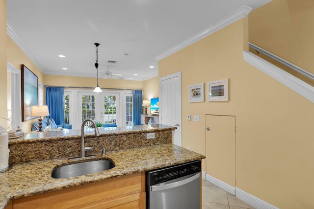 kitchen featuring decorative light fixtures, dishwasher, sink, ornamental molding, and light stone countertops