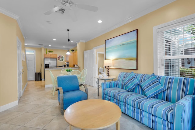 tiled living room featuring crown molding and ceiling fan