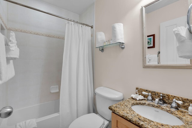 full bathroom with vanity, toilet, and shower / tub combo