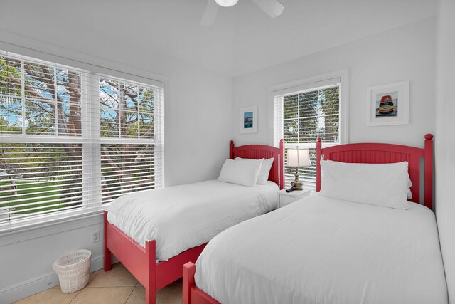 bedroom featuring ceiling fan and light tile patterned floors