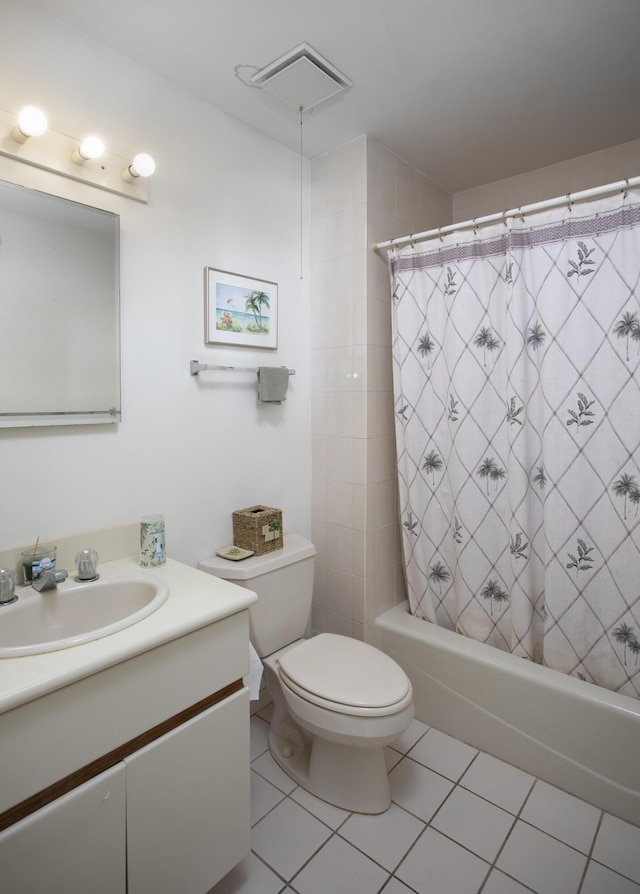 full bathroom featuring vanity, tile patterned flooring, toilet, and shower / tub combo with curtain