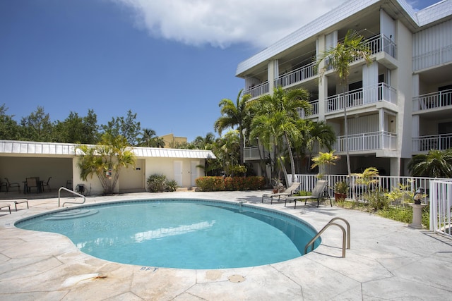 view of pool featuring a patio area