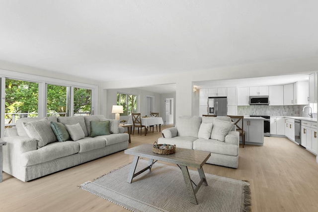 82260 Overseas Hwy, Islamorada, FL 33036 - living room featuring light wood-style floors