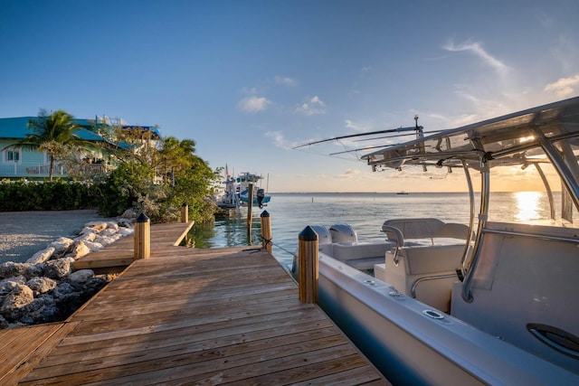 view of dock with a water view