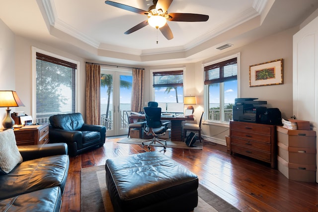 office area featuring french doors, a tray ceiling, and dark hardwood / wood-style flooring