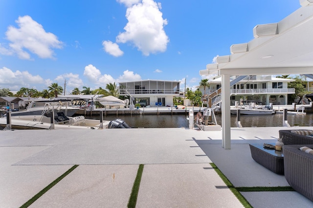 view of patio with a water view