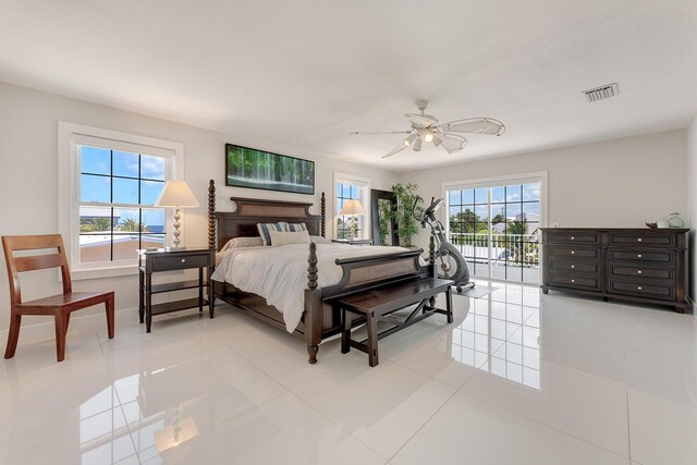 tiled bedroom featuring access to exterior and ceiling fan