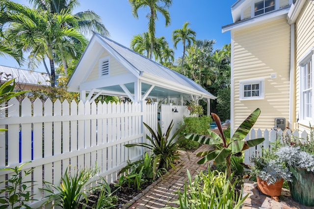 exterior space featuring fence and a gazebo