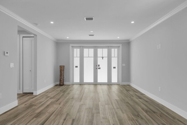 68 Coral Way, Key Largo, FL 33037 - dining space featuring recessed lighting, light wood finished floors, and ornamental molding