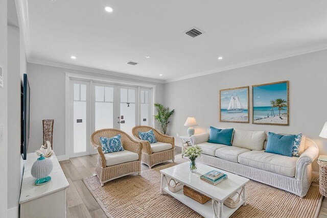 68 Coral Way, Key Largo, FL 33037 - unfurnished room with crown molding, recessed lighting, and light wood-style flooring