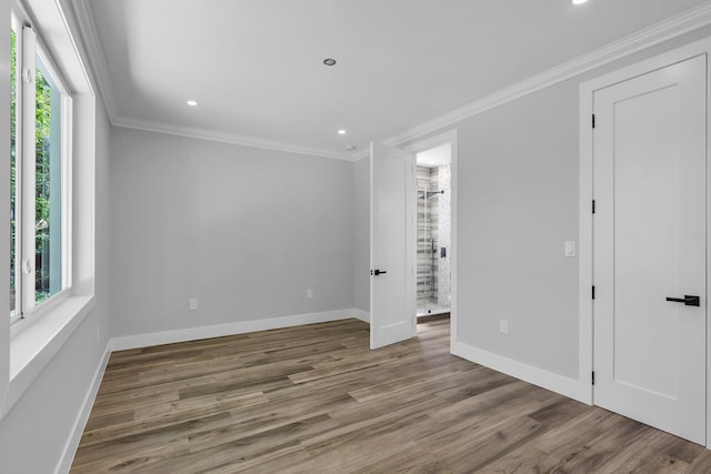 68 Coral Way, Key Largo, FL 33037 - unfurnished room featuring ornamental molding, wood finished floors, and recessed lighting