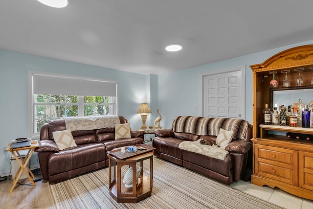 living room featuring light tile patterned flooring