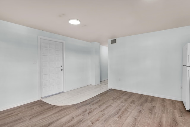 290 Woods Ave, Tavernier, FL 33070 - unfurnished room with baseboards, visible vents, and light wood-type flooring