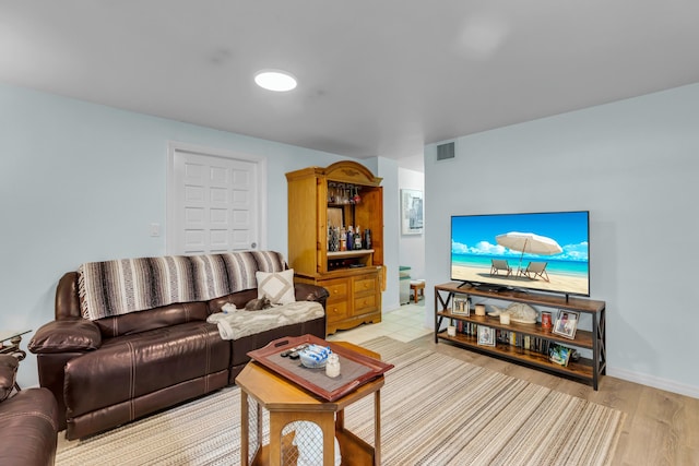 living room with light hardwood / wood-style floors