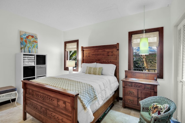 bedroom featuring a textured ceiling