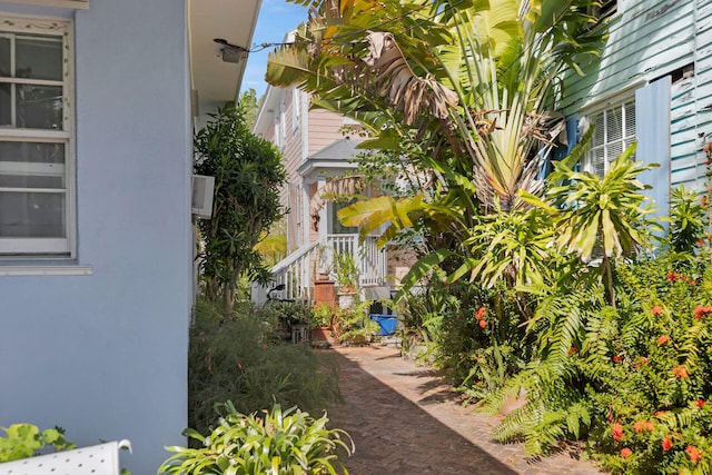 view of side of property featuring stucco siding