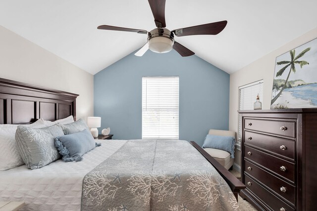 bedroom featuring vaulted ceiling and a ceiling fan