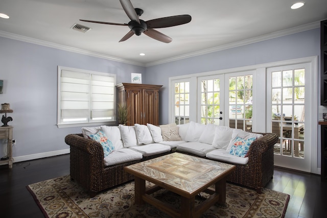 living room with french doors, ornamental molding, plenty of natural light, and dark hardwood / wood-style flooring