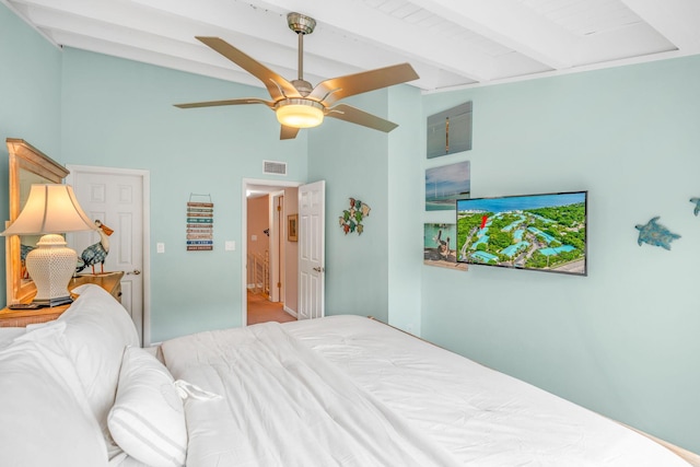 bedroom with vaulted ceiling with beams and ceiling fan