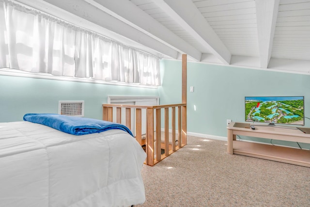 bedroom with beam ceiling