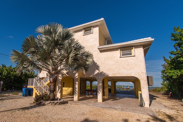 view of front of property featuring a patio