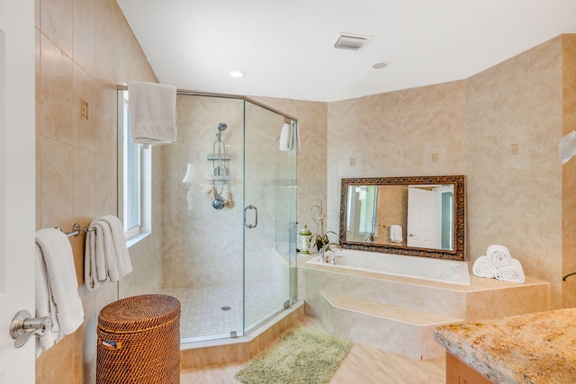 20771 W 2nd Ave, Cudjoe, FL 33042 - full bathroom featuring a bath, a stall shower, vanity, healthy amount of natural light, and recessed lighting