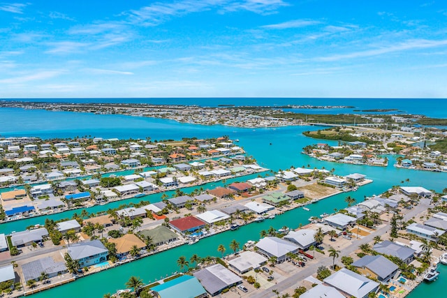 bird's eye view featuring a residential view and a water view