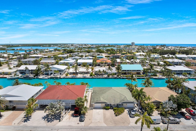 aerial view with a residential view and a water view