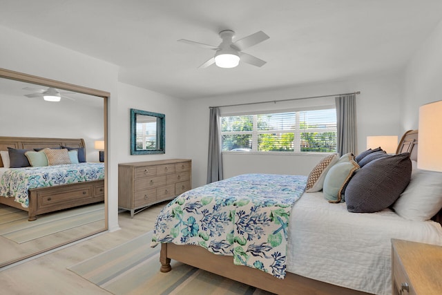 bedroom with a ceiling fan and wood finished floors