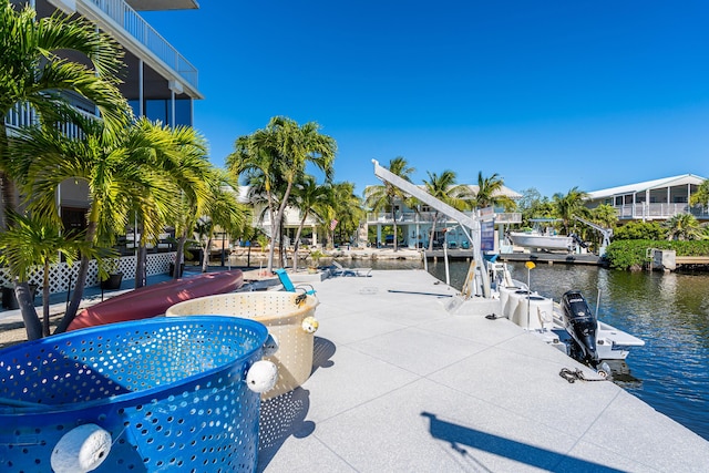 view of pool featuring a water view