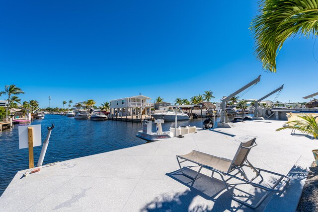 dock area featuring a water view